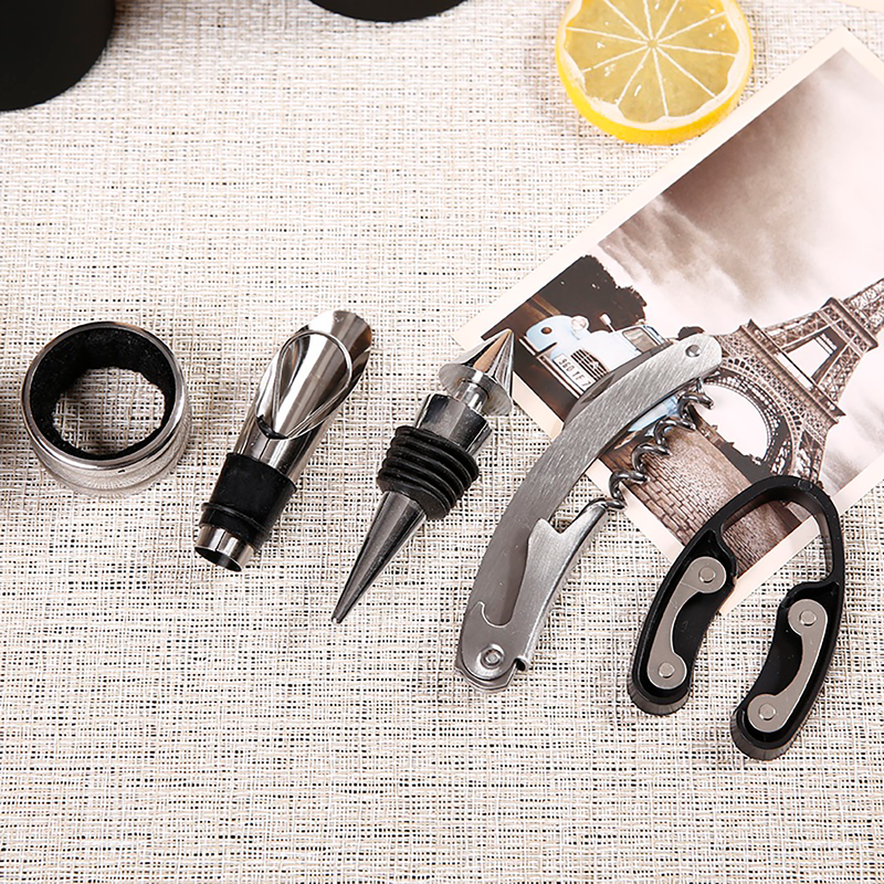 Set para botellas de vino -  Sacacorcho, vertedor, tapón, anillo antigoteo y cortador de papel aluminio.